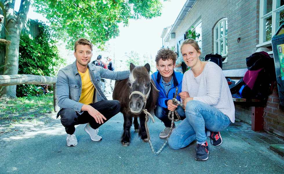 Jan Versteegh met client en begeleider